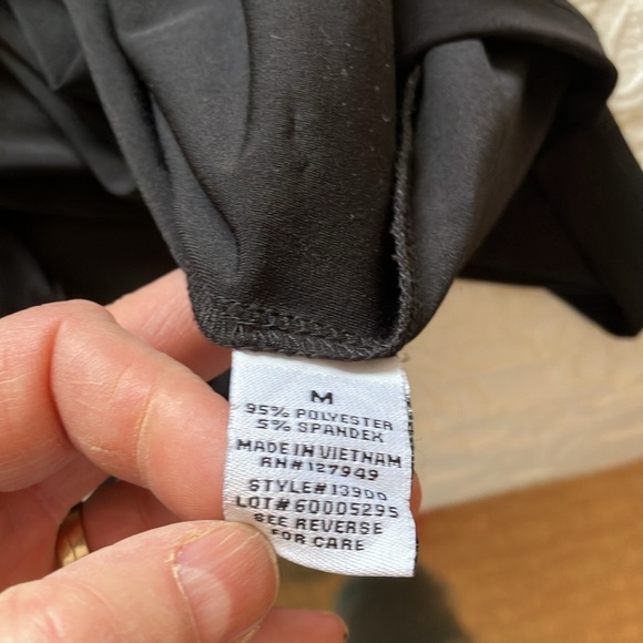 Elegant LBD w/crossover neckline & faux wrap skirt w/gold stud detail. - Picture 13 of 14